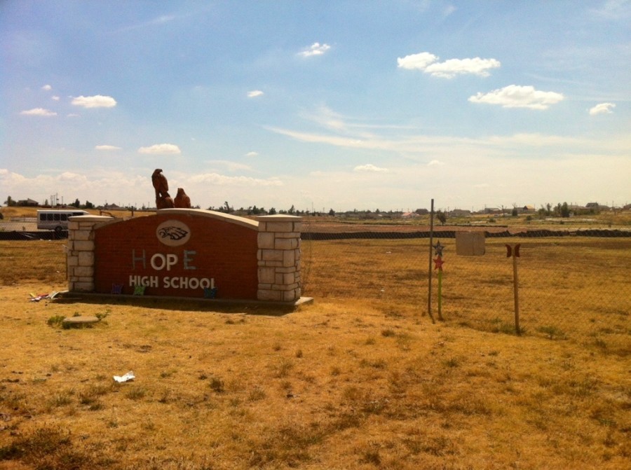 This is where the Joplin High School used to stand. Only an O and a P remained on the sign; an H and an E were added to make the message Hope.